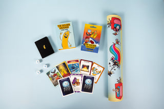 Golden Sausage cards spread across the play mat rolled up